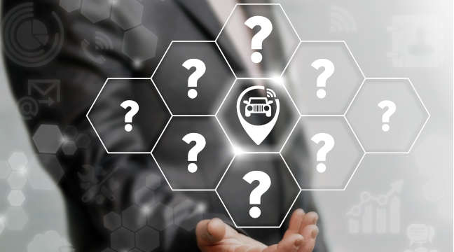 Eine Person im Anzug h&auml;lt eine Illustration von FAQ in der Hand.